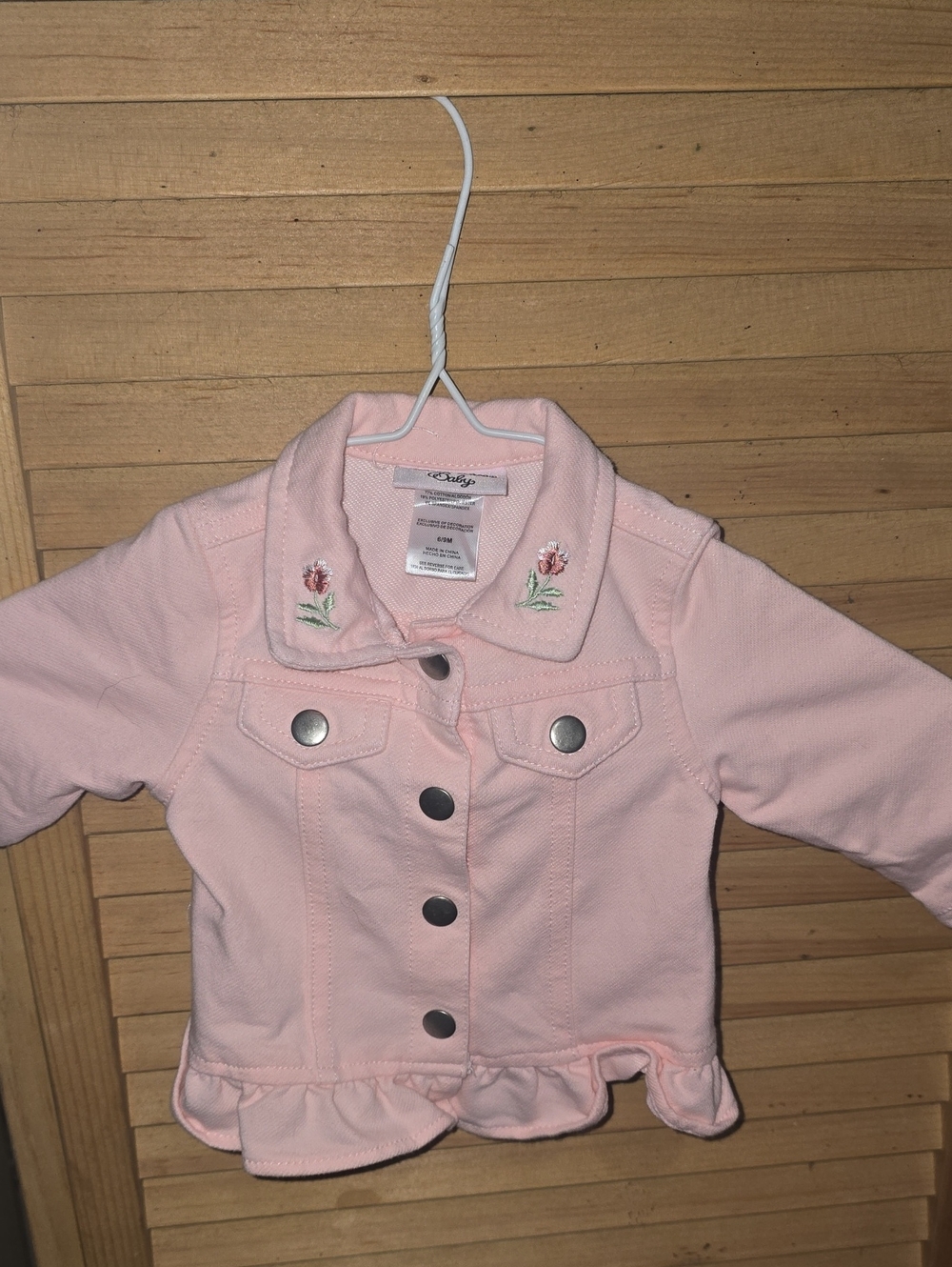 Little Lass light Pink denim jacket featuring floral Design Size 6/9 Months